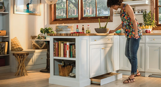 Toe Kick Drawer open in kitchen. Storage to the Floor in the Kitchen. Mastebrand Kemper Cabinets