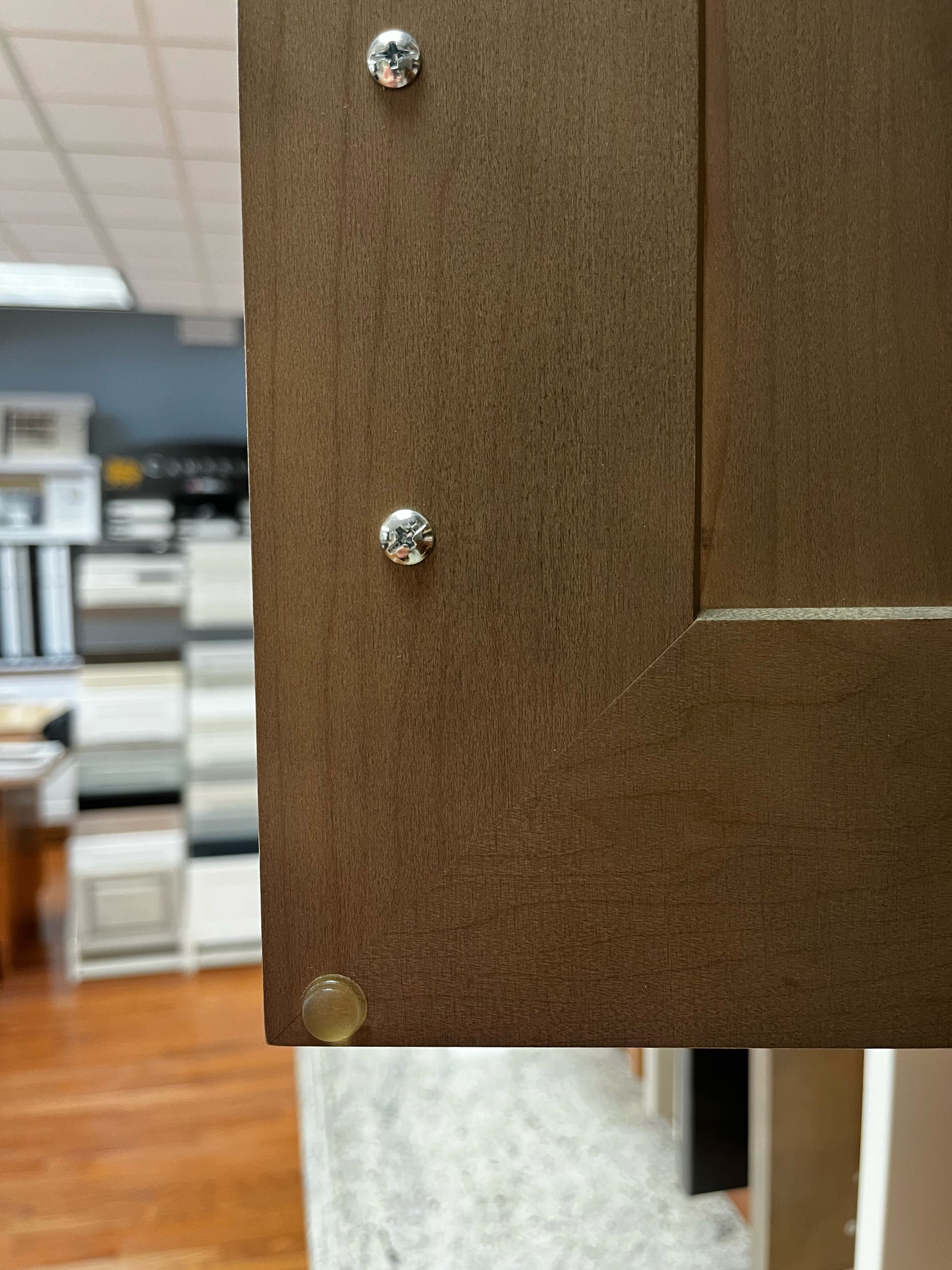 Cabinet Bumper Pads shown on door