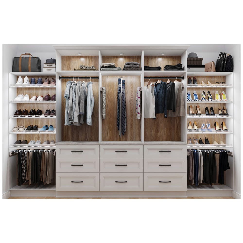 White closet with organizational features for tie storage, belt, jewelry, shoe rails, and more