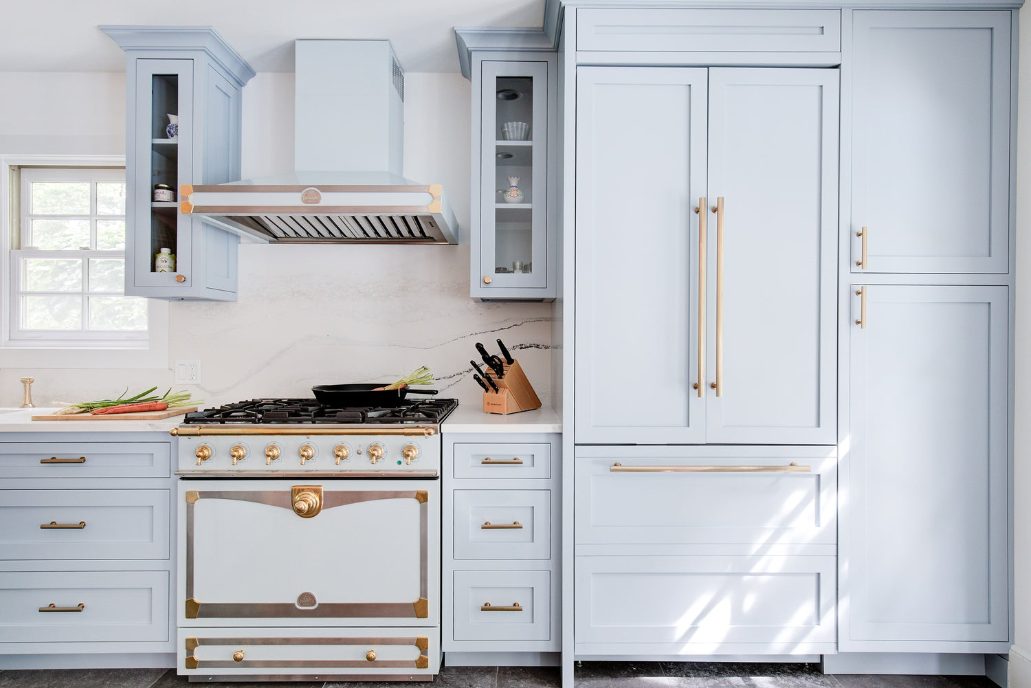 Custom Inset kitchen with Farrow and Ball Parma Gray, with Schwab and Company gold Hardware.