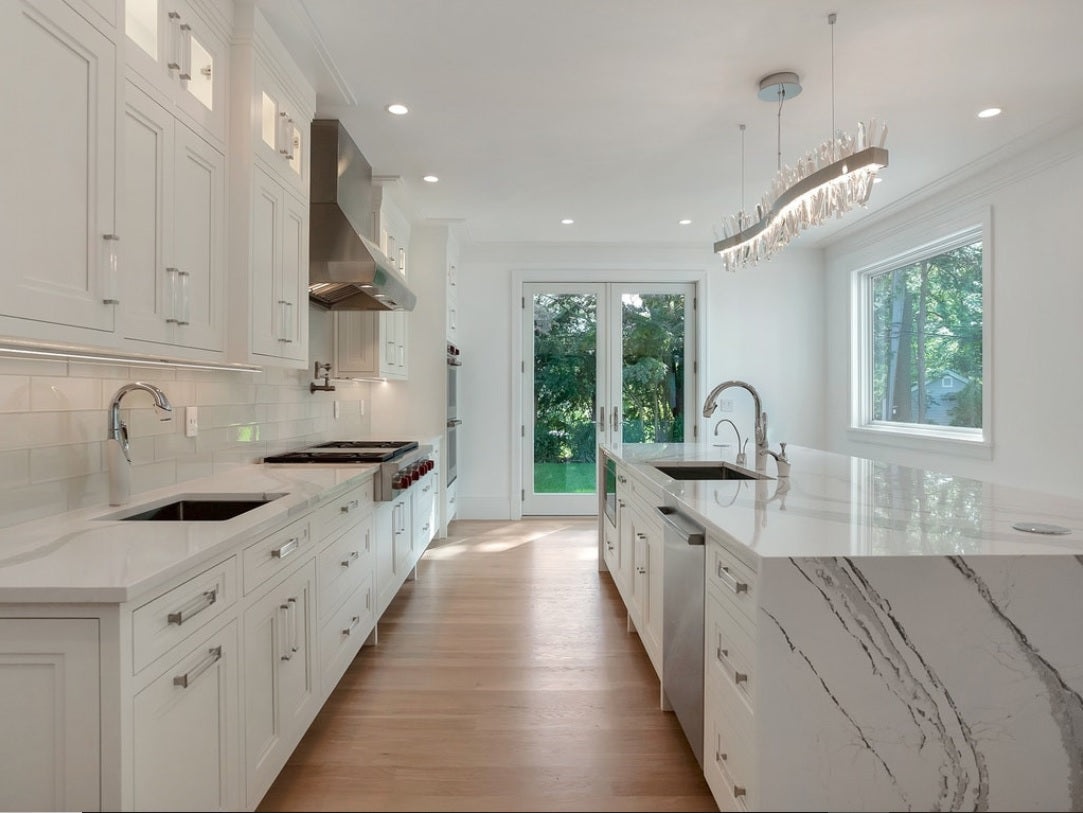White Inset shaker kitchen was island and waterfall end with Cambria Brittanicca quartz.